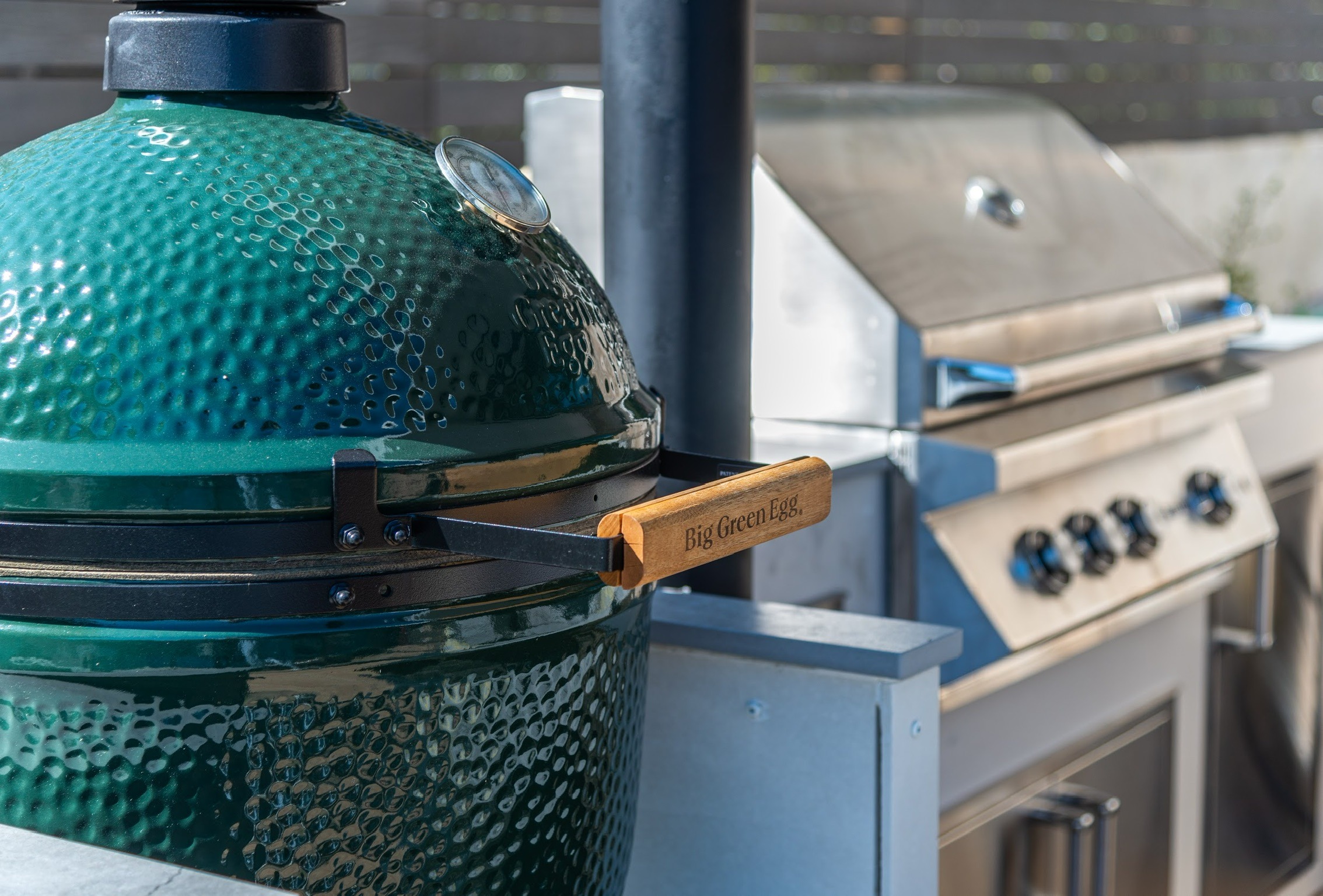 Big Green Egg ceramic grill in outdoor kitchen