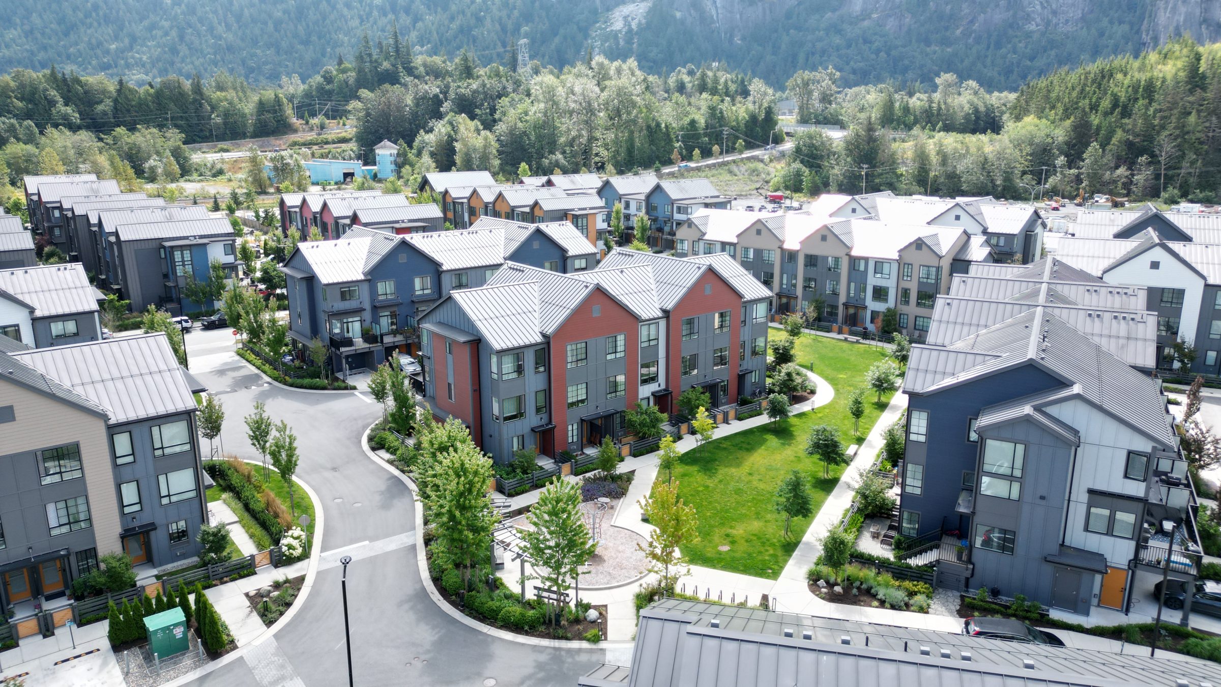 Aerial view of modern townhouses with landscaped courtyard