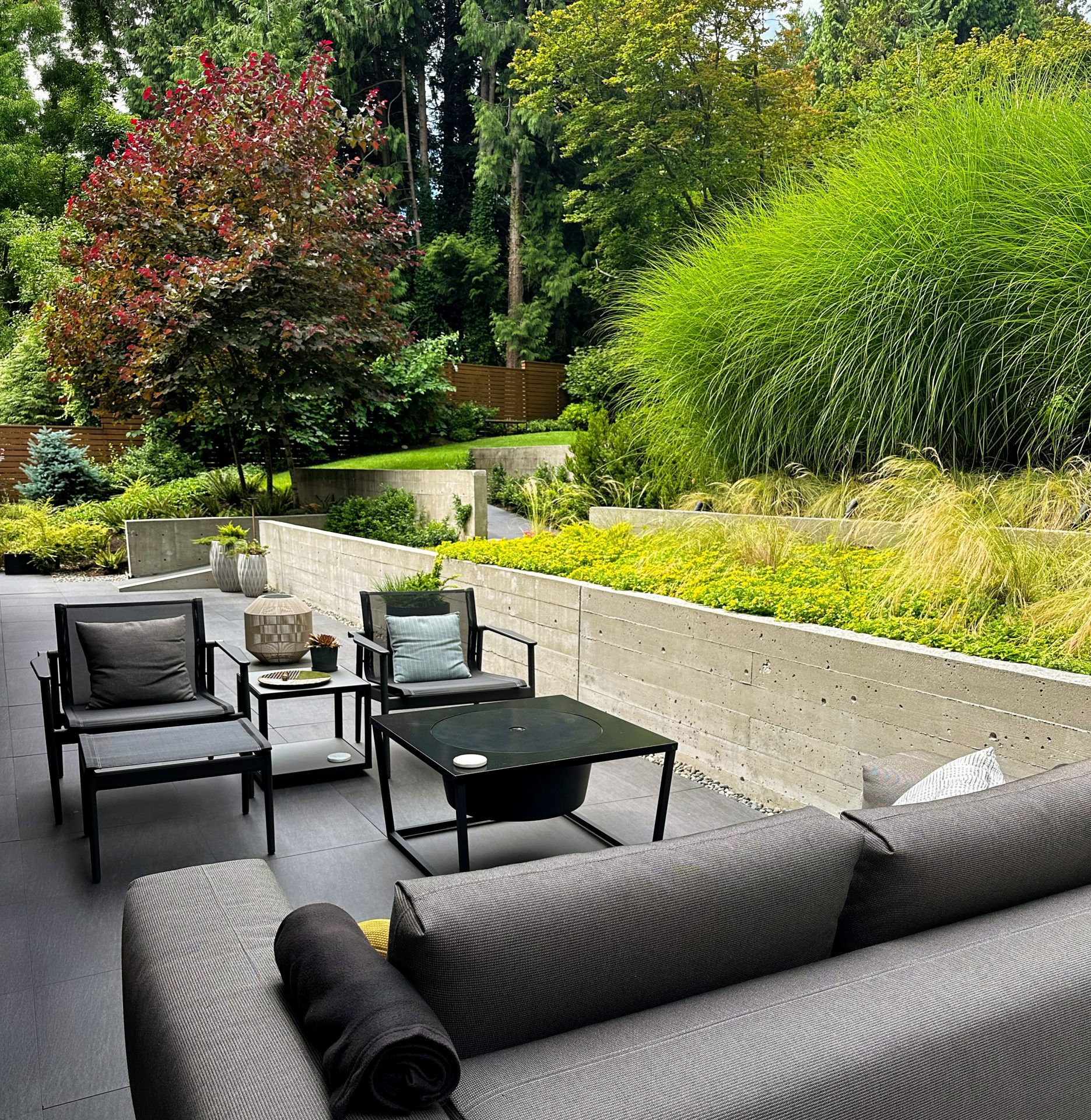 Modern patio with lush landscaped garden